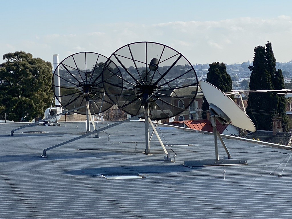 Satellite dishes on rooftop